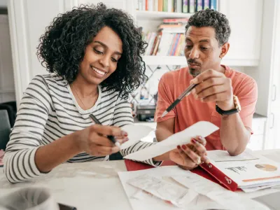 Estate planning illustrated with family document signing